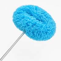 Microfibre duster sleeve wrapping around a ceiling fan blade to clean the top and underside at once
